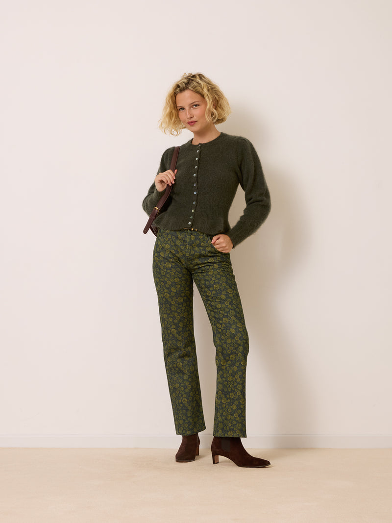 BOTZARIS khaki rosebud print jeans worn on a model by Rouje