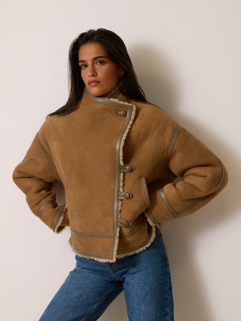 GEDEON taupe sheepskin short coat worn on a model by Rouje