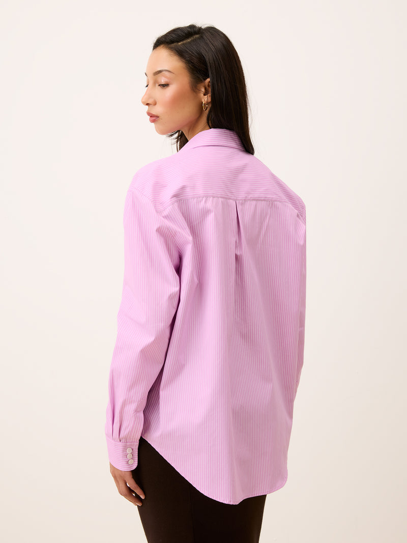 Harper pink striped shirt worn, back view