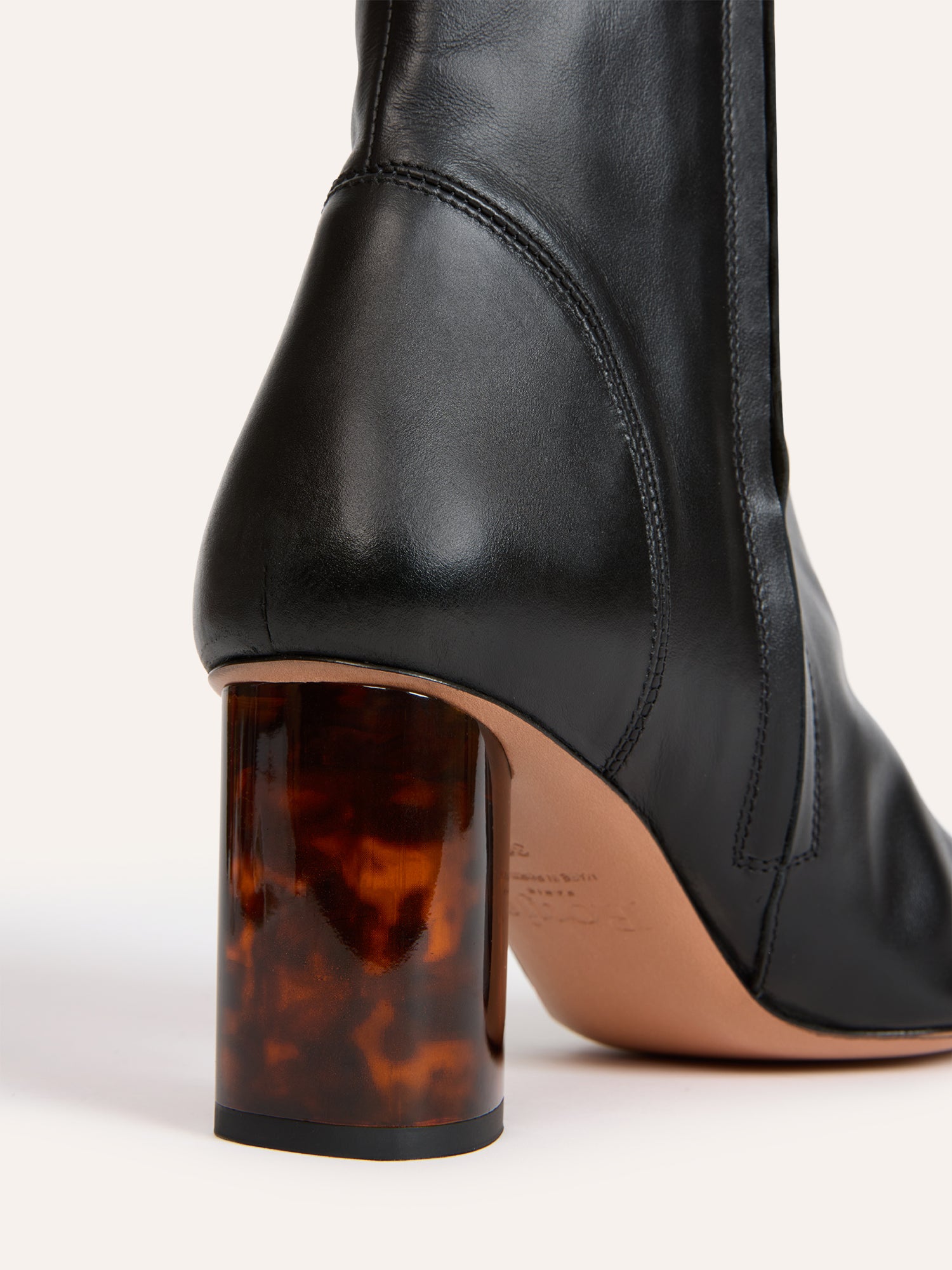 LOULA black leather ankle boots, flat packshot by Rouje
