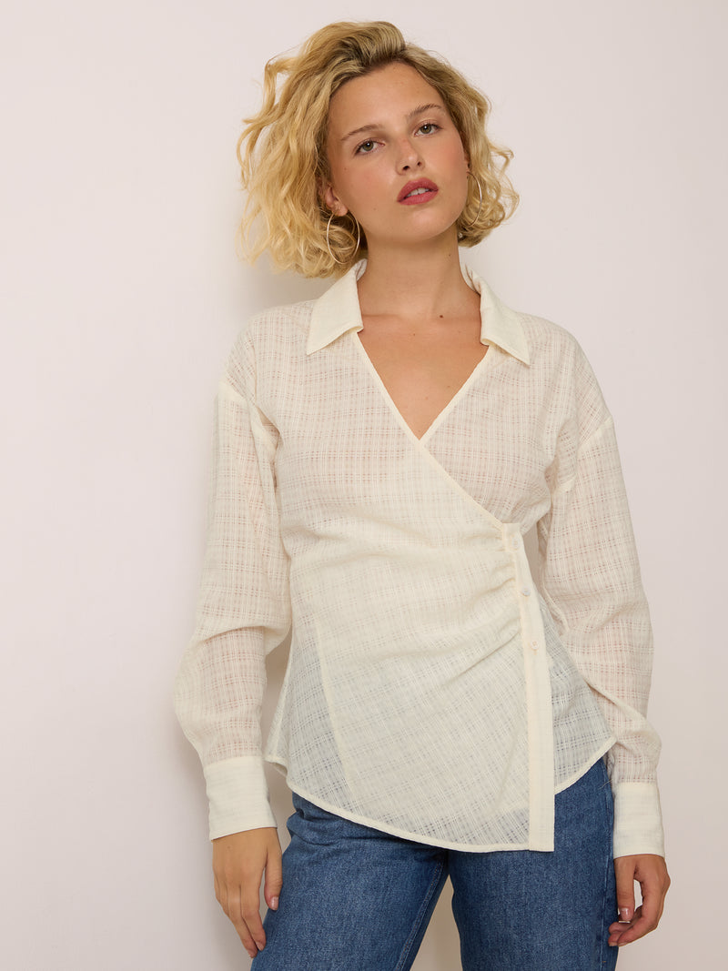 RAVEL white wrap shirt worn on a model by Rouje