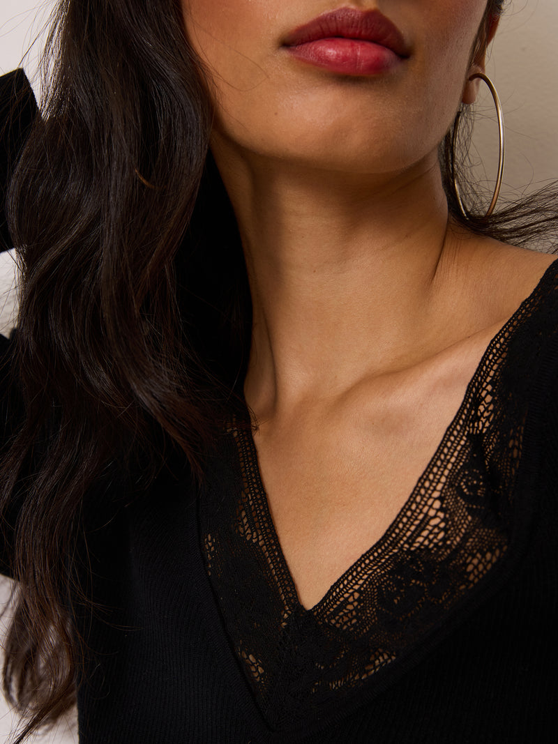 SOLANGE black lace collar top worn on a model by Rouje